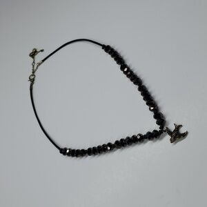 Fossil Brown Beaded Leather Strap Brass Tone Bird Charm Necklace